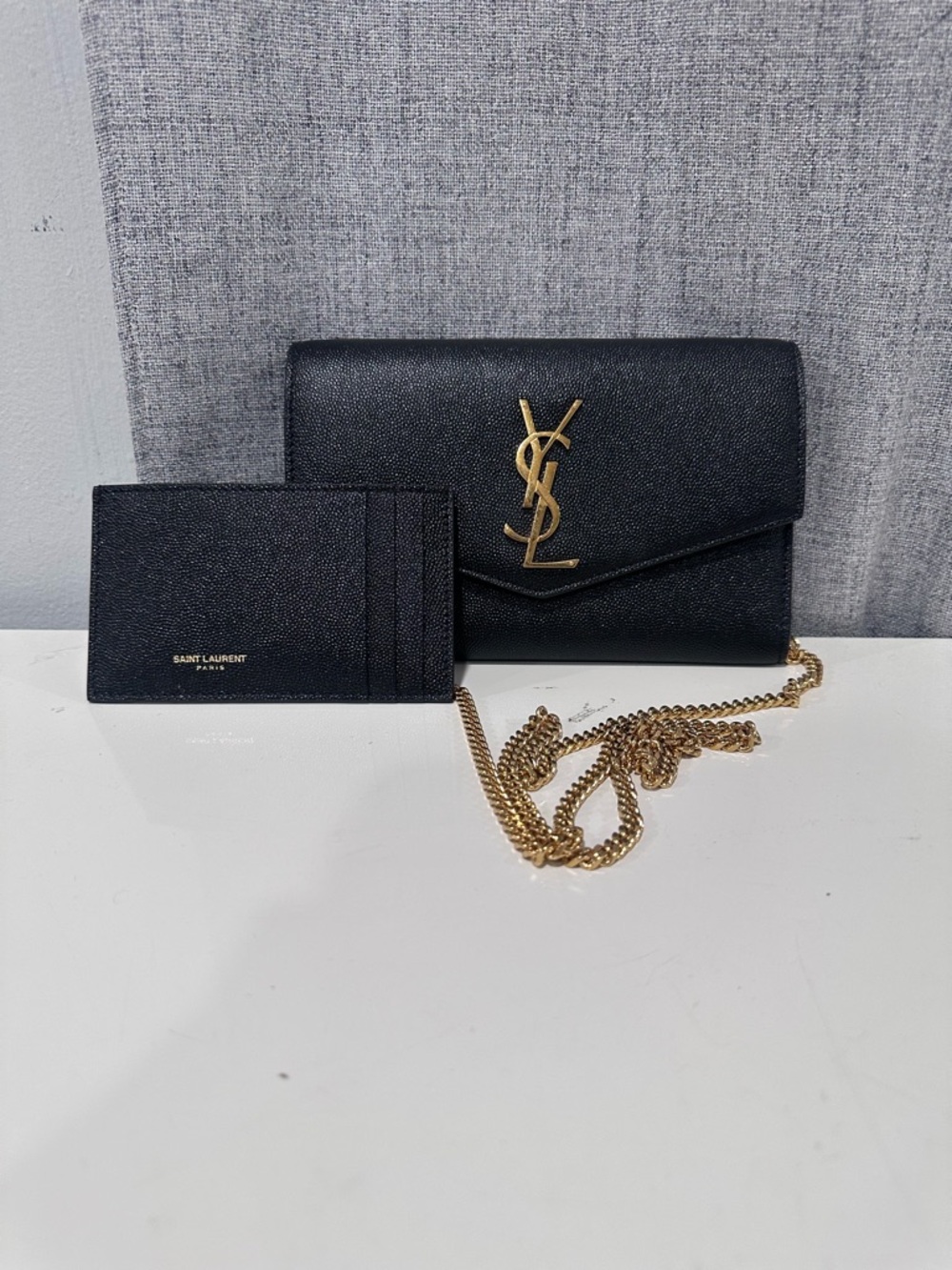 Authentic yves saint Laurent black uptown chain wallet.